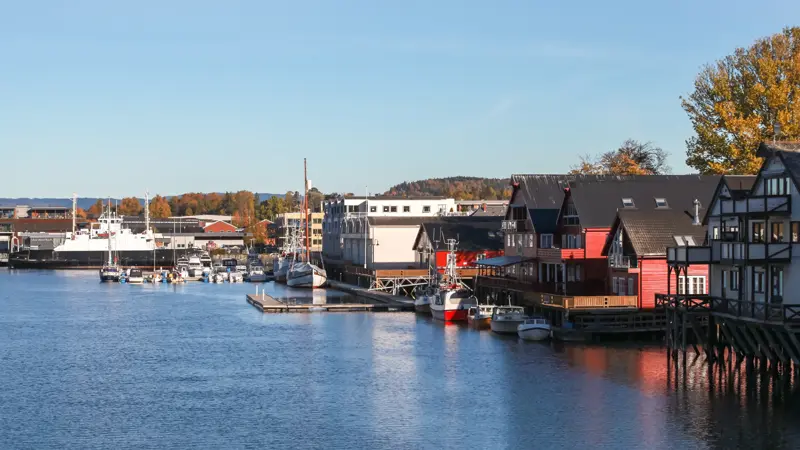 Coastal Norwegian town is under blue sky on a sunny autumn day. Levanger, Norway