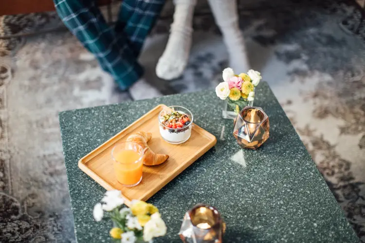 High angle view of healthy breakfast in tray on coffee table at home