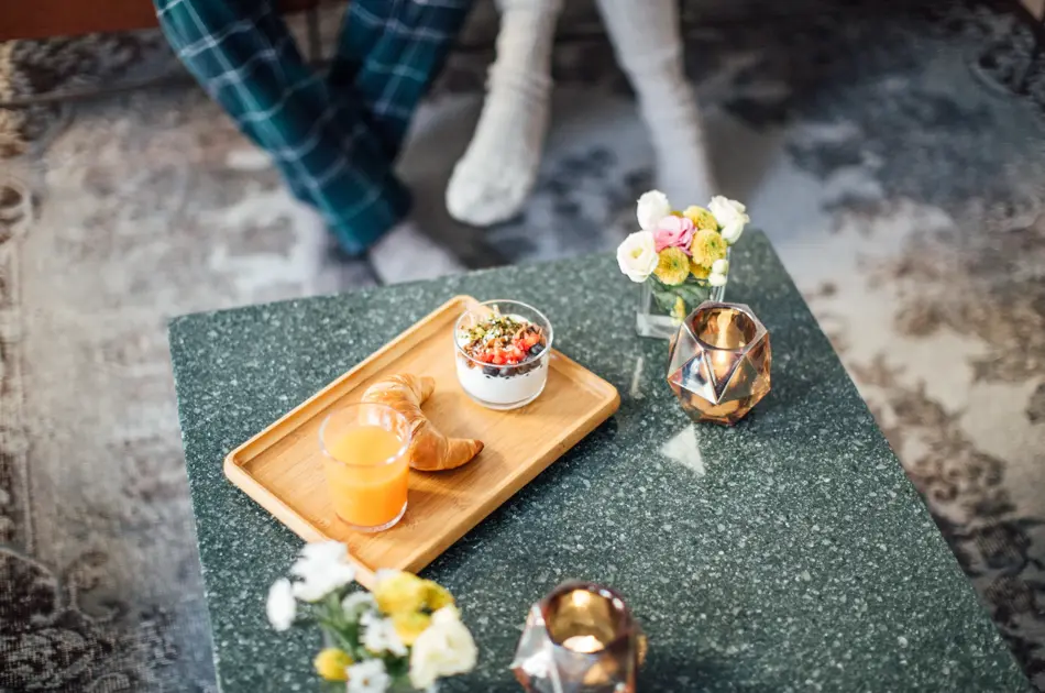 High angle view of healthy breakfast in tray on coffee table at home