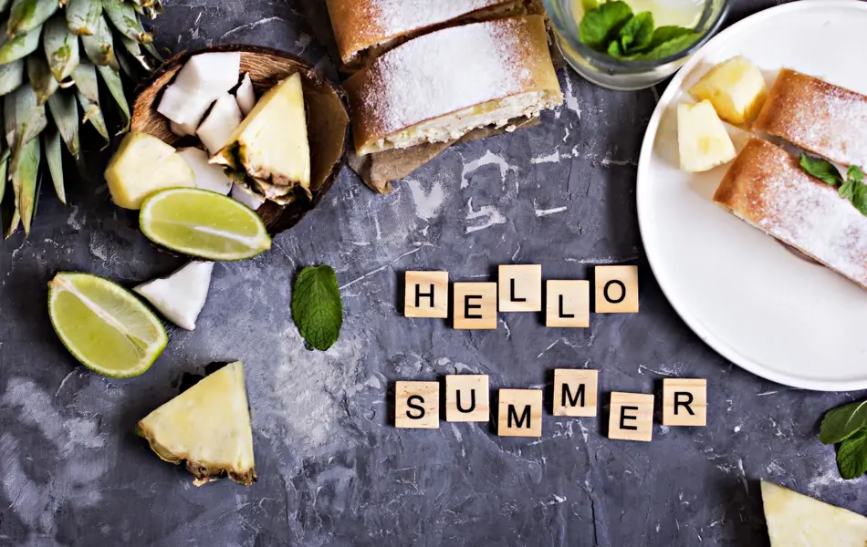 Pie, strudel, cake with cheese and exotic fruits-with pineapple, coconut, lime. The inscription "Hello summer"