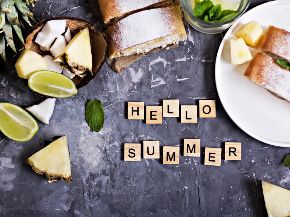 Pie, strudel, cake with cheese and exotic fruits-with pineapple, coconut, lime. The inscription "Hello summer"