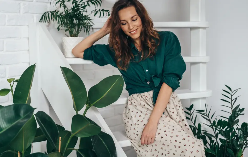 Portrait of young smiling woman at home.