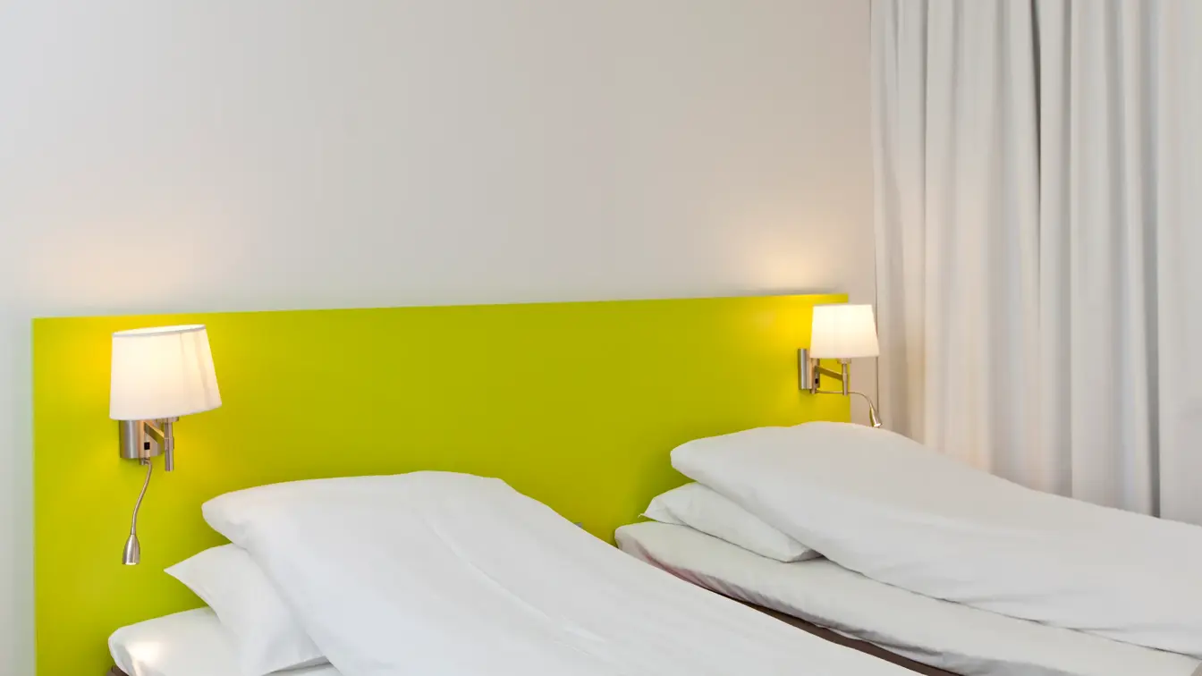 Senger i twin rom på Thon Hotel Munch i Oslo