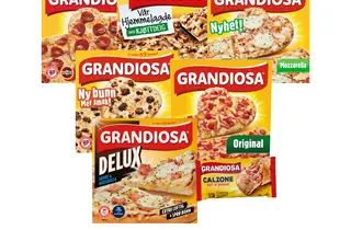Utvalg av Grandiosa frossenpizza i forskjellige varianter.