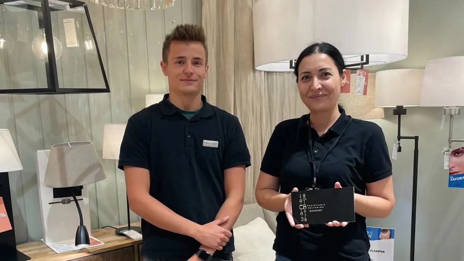 Dame og mann fra Christiania Belysning