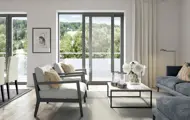 3D illustrasjon av stuen i en leilighet i boligprosjektet Parkodden i Lillestrøm.