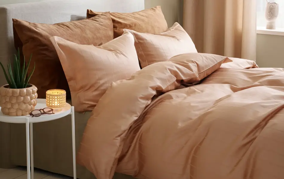 ferskenfarget sengetøy