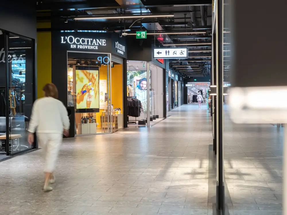 Bildet viser kjøpesenteret Ski Storsenter og et utvalg av butikkene.