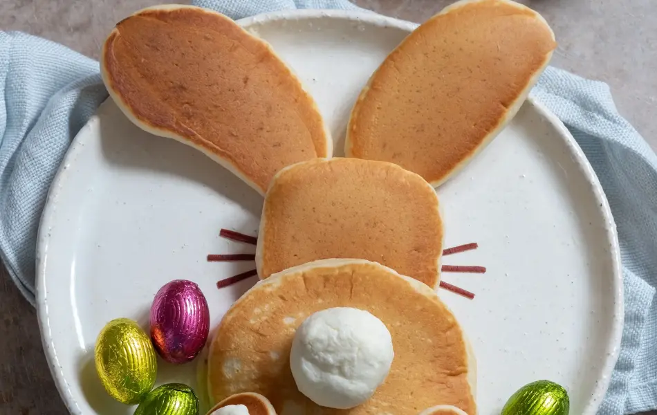 Easter funny bunny pancakes with chocolate eggs