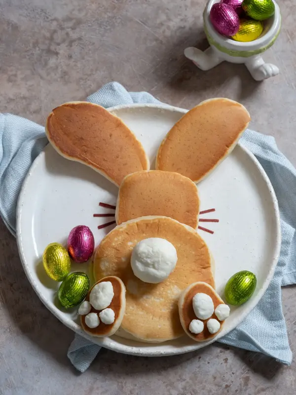 Easter funny bunny pancakes with chocolate eggs