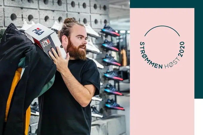 Mann som viser moteklær