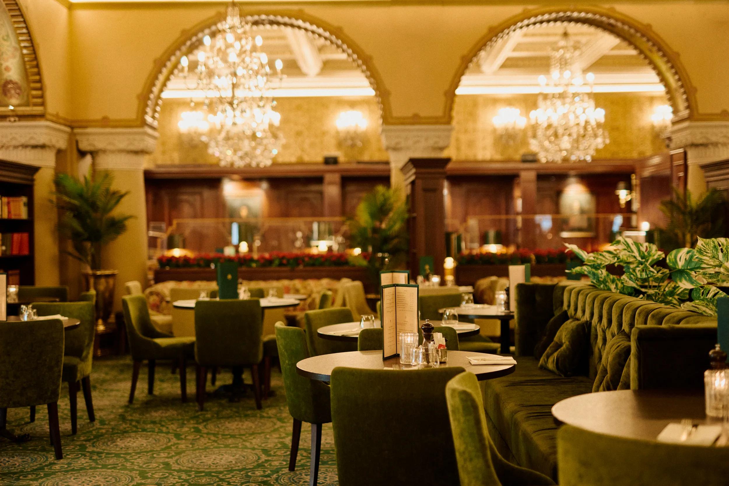 Employee polishing and adjusting the chandelier