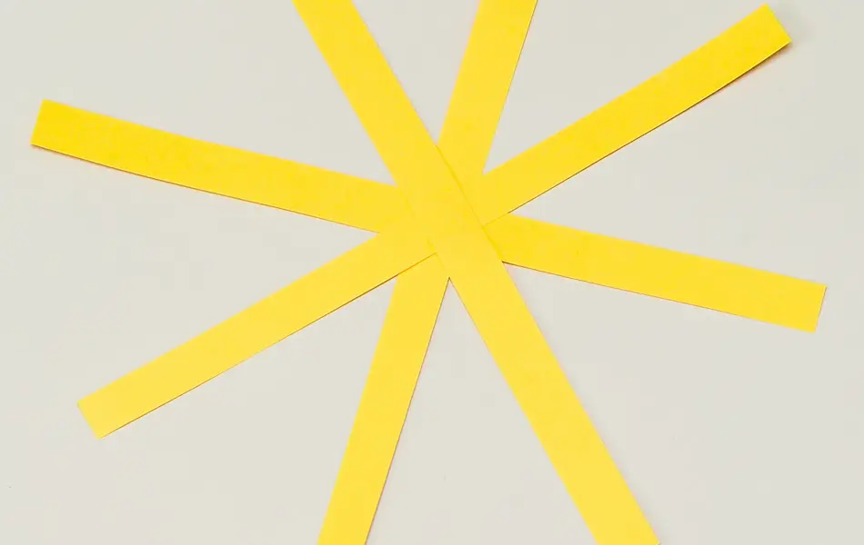 Gule striper lagt sammen til en stjerne