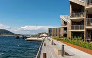 Bildet viser fasaden på boligprosjektet Lehmanns Brygge i Drøbak.