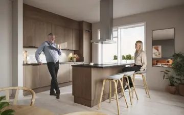 Illustrasjon av kjøkken med en mann og en kvinne fra boligprosjektet Skårerløkka PREMIUM i Lørenskog.
