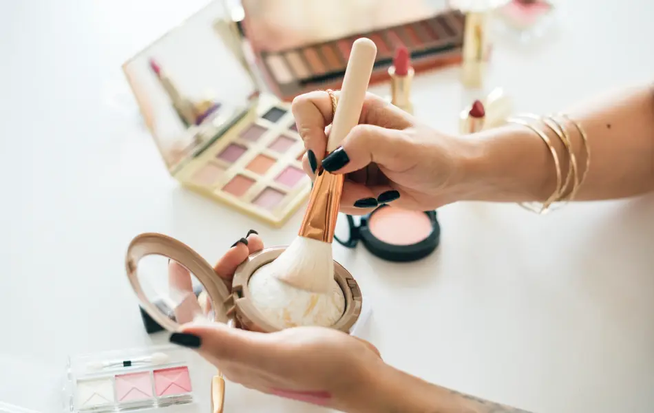 Beauty blogger producing makeup tutorial