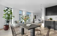 Bildet viser et kjøkken med spiseplass i boligprosjektet Solseilet i Tromsø.