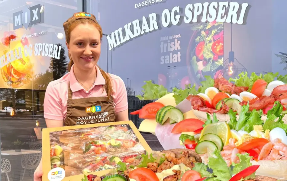 En jente omringet av baguetter og Croisanter