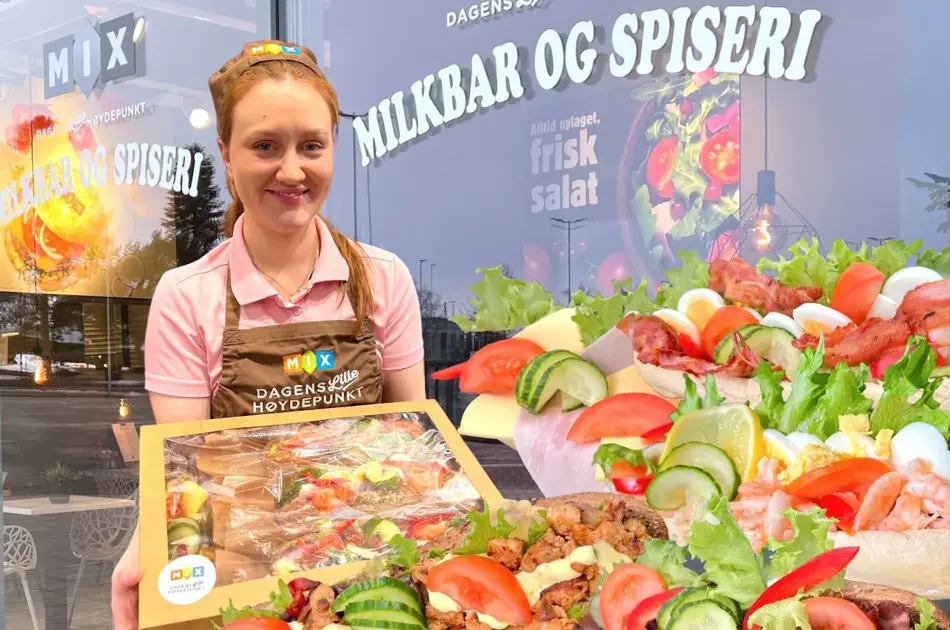 En jente omringet av baguetter og Croisanter