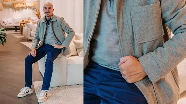 Mann med beige genser, olabukse og sneakers