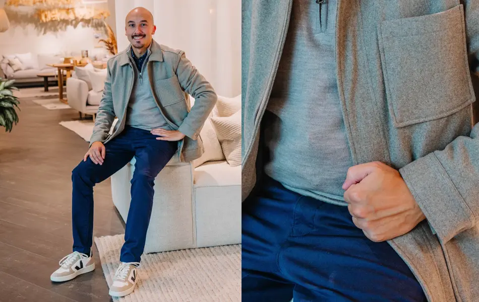 Mann med beige genser, olabukse og sneakers