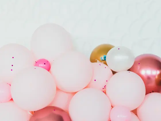 pink gold and beige balloons photo wall decoration for birthday or party