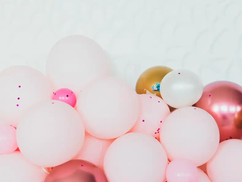 pink gold and beige balloons photo wall decoration for birthday or party