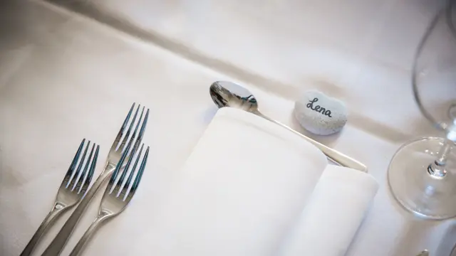 Table setting detail at a wedding reception.
