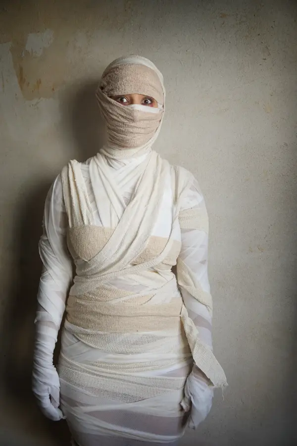 woman wrapped in bandages as egyptian mummy halloween costume