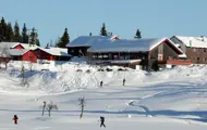 Vinterlandskap på utsiden av Austlid Fjellstue på Thon Hotel Skeikampen