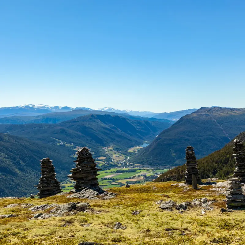 Landscape with cairns in Rondane National Park, with view to Gudbrandsdalen and Sel