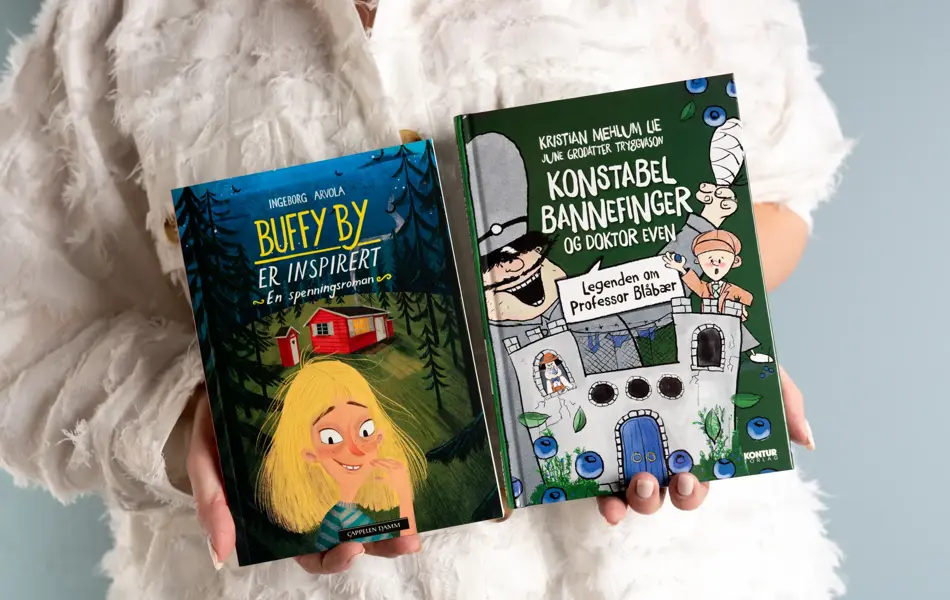 Dame som holder to barnebøker