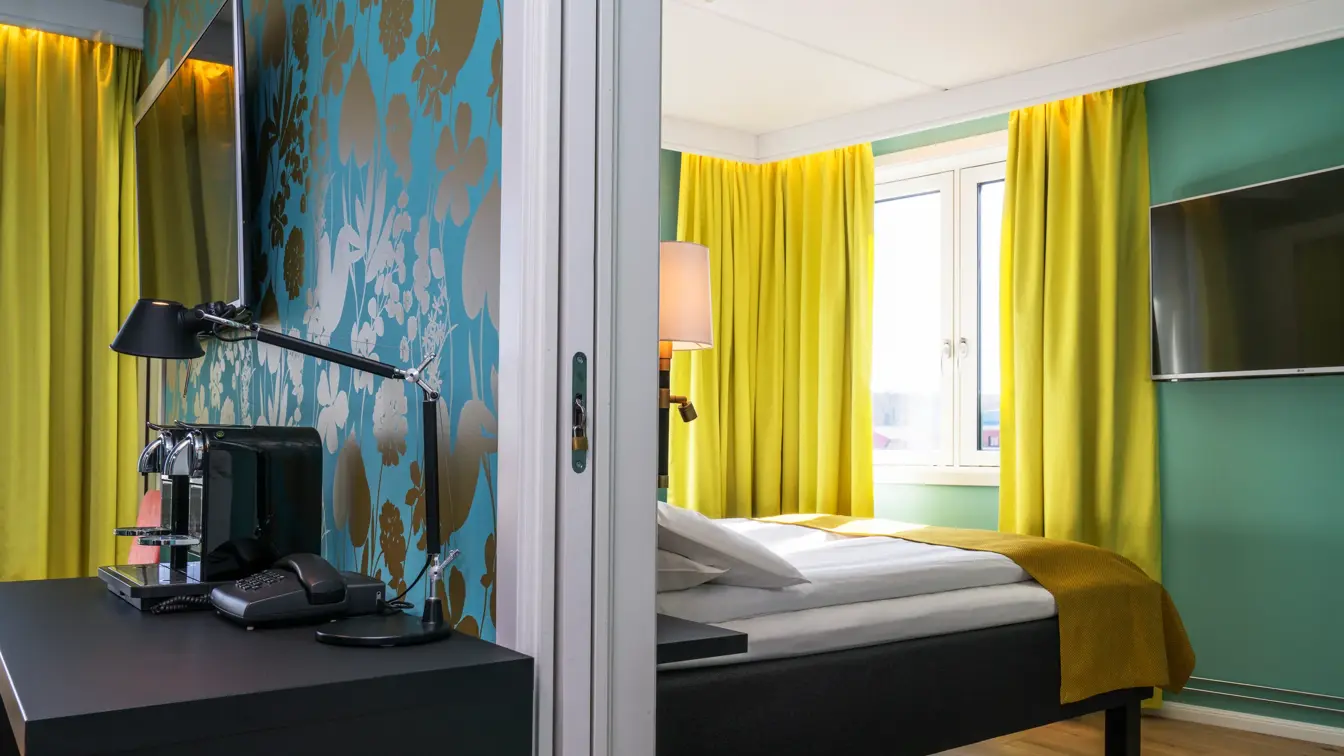 Nespreso maskin og dobbeltseng i business rom på Thon Hotel Nidaros