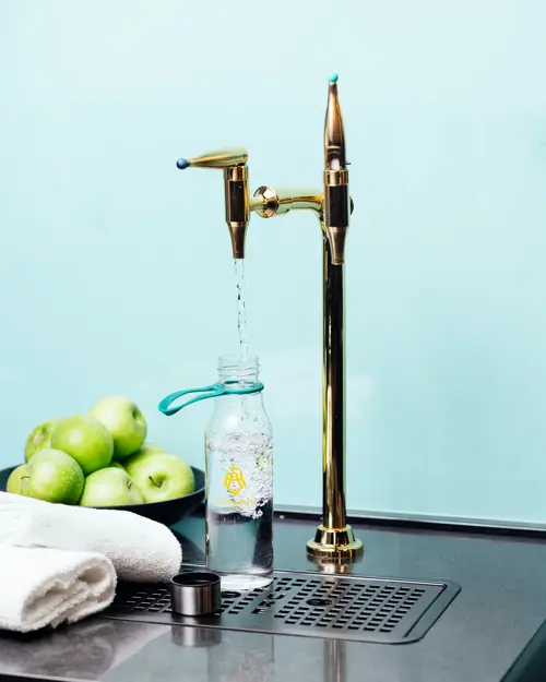 Vannstasjon, eple, håndklær 