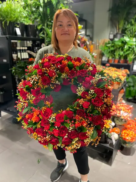 Vannessa med blomsterkrans