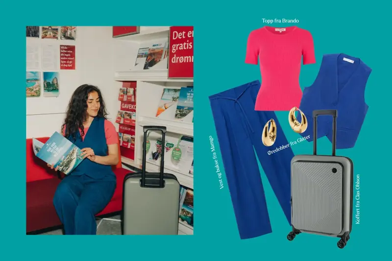 Jente på reissebyrå med koffert