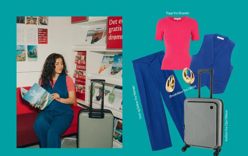 Jente på reissebyrå med koffert