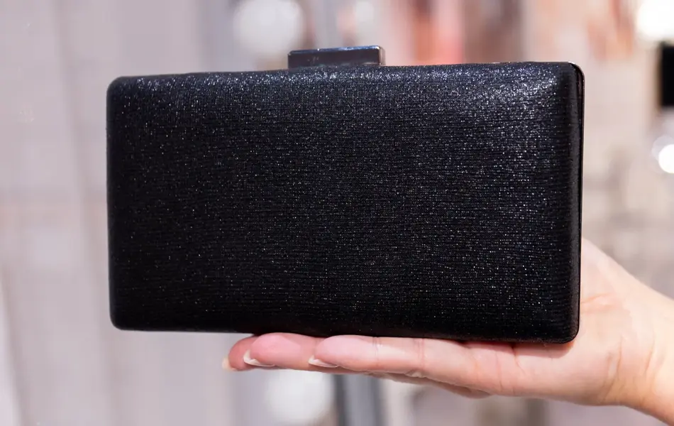 Sort glitrende clutch