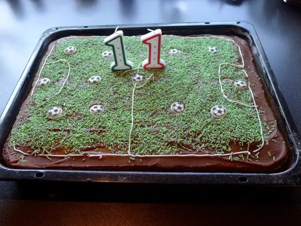 Chocolate cake with fotball decoration for 11th birthday