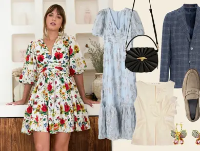 Dame i blomstrete kort kjole lener seg mot en benk. Lang lyseblå kjole med sølvdetaljer, sort skulderveske, beige topp, øredobber med stener, blå blazer, semskede brune loafers.