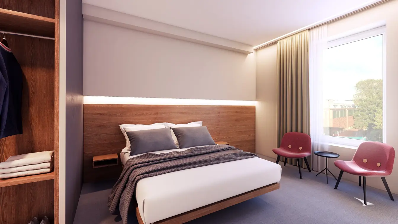 Soverom med dobbeltseng, gardiner og klesskap