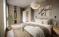 3D illustrasjon av boligprosjektet Skårerløkka PREMIUM på Lørenskog. På illustrasjonen vises et soverom med vegger og interiør i beige toner.