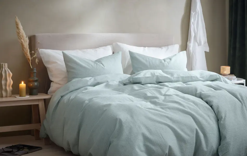 lyseblått sengetøy