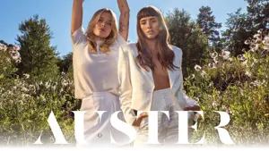 To damer og logoen til Auster