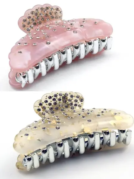 Bilde av 2 hårklyper, en rosa og en hvit