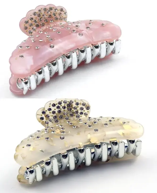 Bilde av 2 hårklyper, en rosa og en hvit