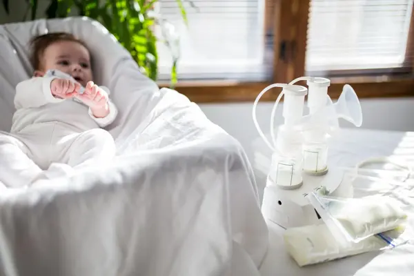 Breast pump equipment and bottle of breast milk for new born baby