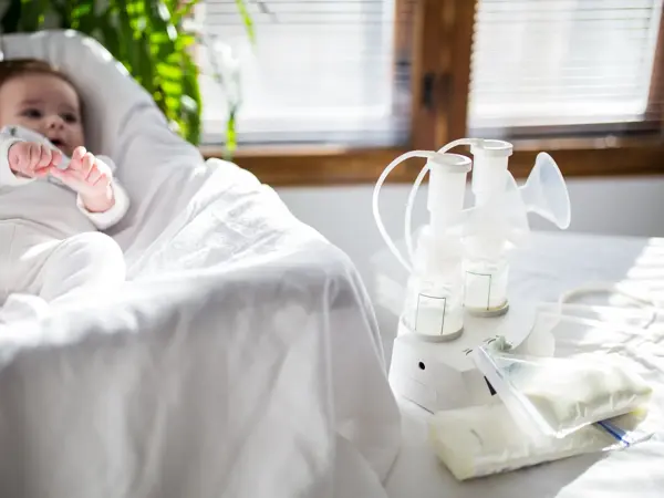 Breast pump equipment and bottle of breast milk for new born baby