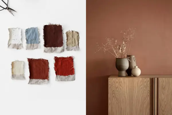 farge prøver og en skjenk i tre med vaser på foran en terrakotta vegg.