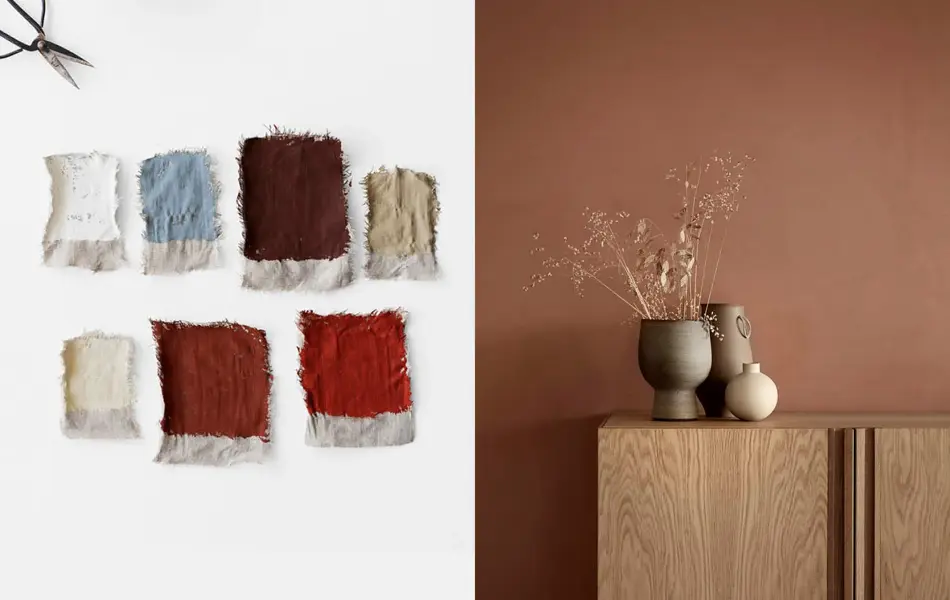 farge prøver og en skjenk i tre med vaser på foran en terrakotta vegg.